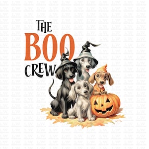 May include: Four dogs dressed in Halloween costumes, including a witch hat, a pumpkin costume, and a wizard hat, are gathered around a jack-o-lantern. The text "The Boo Crew" is above the dogs.