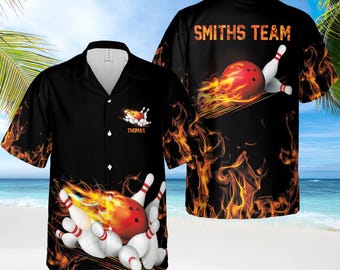 May include: Two black and orange Hawaiian shirts with a bowling ball and pins design. One shirt says "Smiths Team" and the other says "Thomas".