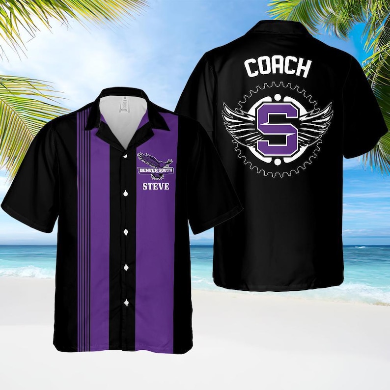 May include: Black and purple short-sleeved shirt. The shirt has a purple vertical stripe down the front and the text "DENVER SOUTH" and "STEVE". The back of the shirt features the word "COACH" and a winged "S" logo.