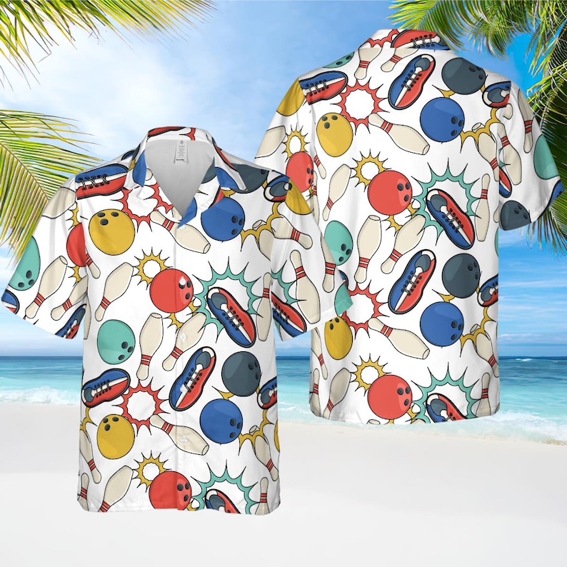 May include: White short-sleeved button-down shirt with a bowling-themed pattern. The design features bowling pins, bowling balls, and bowling shoes in red, blue, yellow, and teal, set against a white background. The shirt has a classic collar and a relaxed fit.
