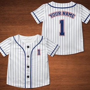 May include: White baseball jersey with blue pinstripes and a blue number 1 on the front and back. The back of the jersey has the text "YOUR NAME" in red.