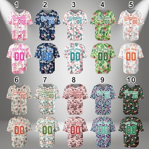May include: Twenty baseball jerseys with a tropical floral print. The jerseys are in various colors, including pink, blue, green, white, and red. The jerseys have a team name and number on the front. The jerseys are all in a row, numbered 1 through 10.