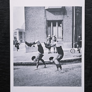 Robert Doisneau "The two brothers, Paris, 1934" On the back ©2014 Atelier Robert Doisneau Dimensions: 25.5 x 33.5 cm.