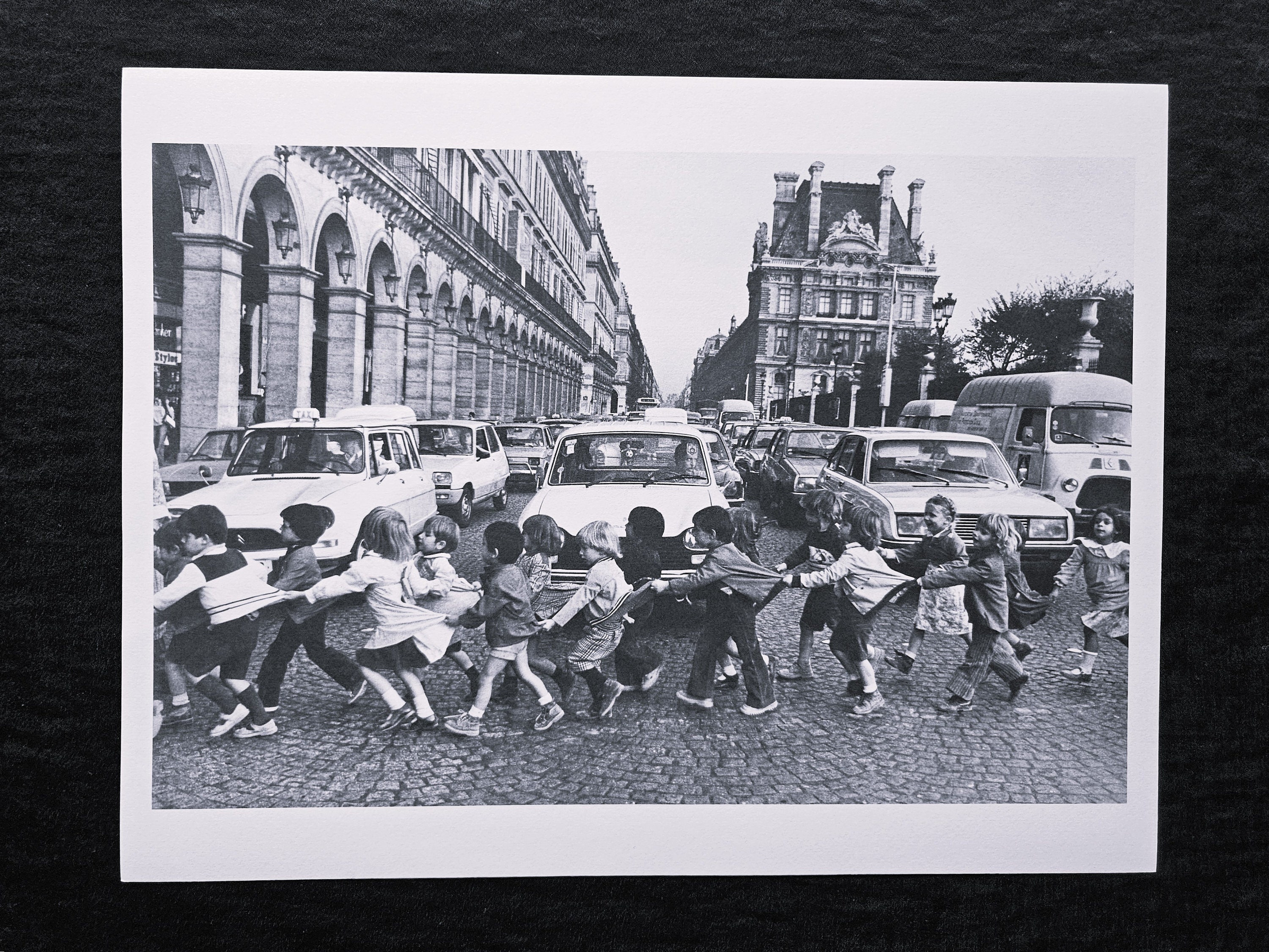 Robert Doisneau "Pinafores on Rue de Rivoli, Paris, 1978" On the back ©2014 Atelier Robert Doisneau Dimensions: 25.5 x 33.5 cm.