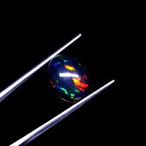 AAAAA Grade Natural Black Opal Cabochon Gemstone+Welo Fire Black Opal+ Handmade Oval Shape Opal+October Birthstone Gemstone, Size 14x10 MM.