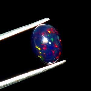 AAAAA Grade Natural Black Opal Cabochon Gemstone+Welo Fire Black Opal+ Handmade Oval Shape Opal+October Birthstone Gemstone, Size 10x7 MM.