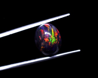 AAAAA Grade Natural Black Opal Cabochon Gemstone+Welo Fire Black Opal+ Handmade Oval Shape Opal+October Birthstone Gemstone, Size 13x11 MM.