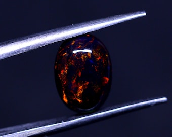 Natural Black Opal Northern lights pattern fire, Black Opal Oval shape cabochon. Welo Opal from Ethiopia -11x8x4 mm Red Fire Black Opal Cab.