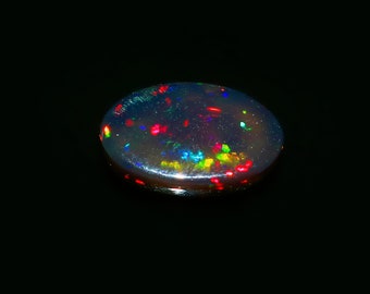 Natural Ethiopian Black Opal Cabochon Oval Ethiopian Black Opal Cabochon, AAA+Dotted Fire Beautiful Black Opal Size 16x11x5 mm 5.25 Carat...