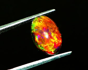 AAAAA Grade Natural Black Opal Cabochon Gemstone+Welo Fire Black Opal+ Handmade Oval Shape Opal+October Birthstone Gemstone, Size 12x8x7 MM.