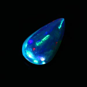 May include: A teardrop-shaped blue opal gemstone with green and red flashes of color.