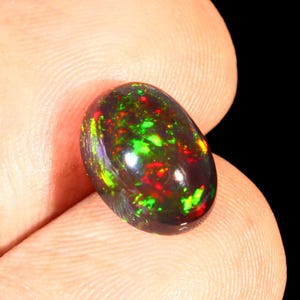 Natural Ethiopian Black Opal Cabochon,MultiFire Opal Gemstone,Red Green Play of Color Opal,Loose Black Opal,October Birthstone Size 11x8 mm.