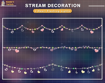 May include: Three rows of pink heart-shaped lights strung on a white string. The lights are against a dark blue background with a grid pattern. The text "STREAM DECORATION 3 Heart Flashing Lights" is at the top of the image.