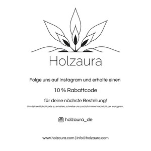 May include: White background with the logo "Holzaura" and text in German. The logo is a black line drawing of a stylized plant. The text includes a call to action to follow on Instagram for a discount code.