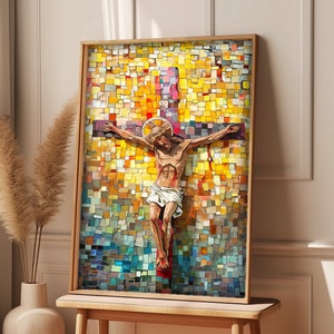 May include: A framed mosaic artwork depicting the crucifixion of Jesus. The artwork features a vibrant, colorful mosaic design with a wooden frame. The image is displayed on a small wooden table in a well-lit room.