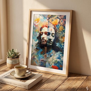 May include: A framed art print featuring a split portrait of a spiritual figure. The artwork is a colorful watercolor style with warm and cool tones. The print is displayed on a wooden surface with a cup of tea and a book.