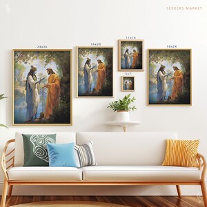 May include: A framed print of a painting depicting two figures standing by a river. The figures are wearing blue and orange robes. The painting is set against a backdrop of lush greenery and a blue sky. The print is available in various sizes, including 24x36 inches, 18x24 inches, 16x20 inches, 11x14 inches, and 5x7 inches.