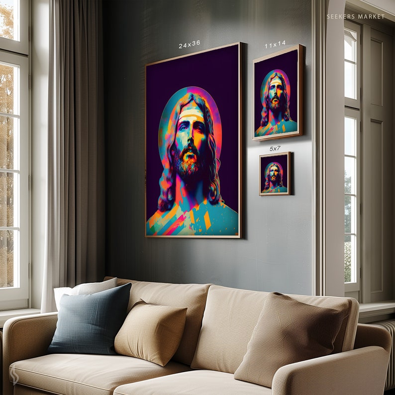 a living room with a couch and paintings on the wall