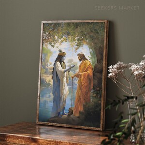 May include: A painting of two figures, one in blue robes and the other in orange robes, standing in a forest setting. The figure in blue robes holds a staff and the figure in orange robes holds a hand out towards the other figure.