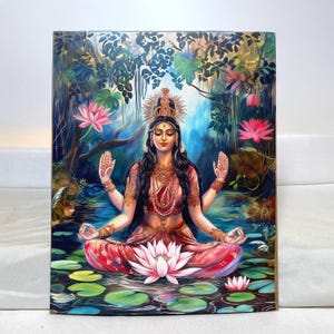 May include: A painting of a Hindu goddess sitting in a lotus position on a bed of lotus flowers. She has four arms, a crown, and is wearing a red and gold sari. The background is a lush green forest with a blue sky.