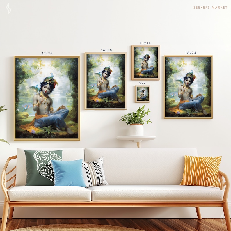a living room with a couch and paintings on the wall