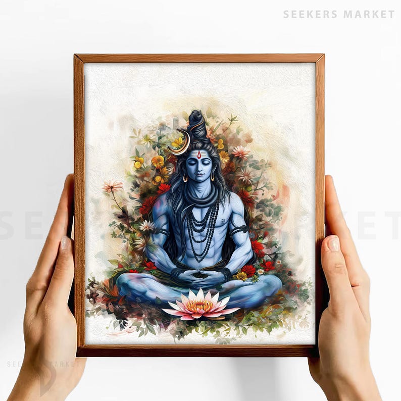 May include: A watercolor painting of a Hindu deity, Shiva, meditating in a lotus position. He is surrounded by flowers and greenery, and has a third eye on his forehead. The painting is framed in a brown wooden frame.