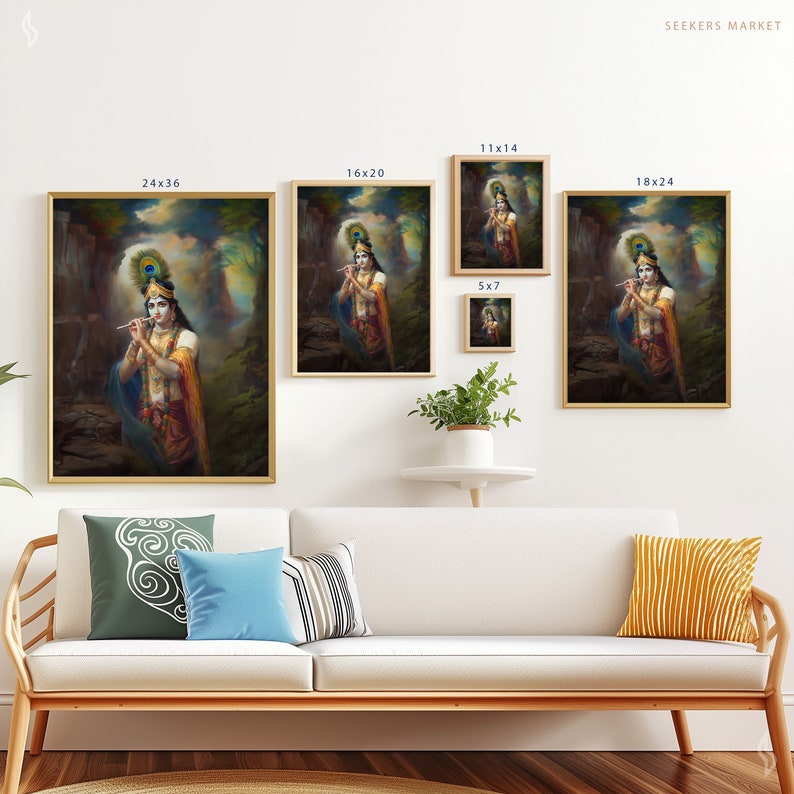 a living room with a couch and paintings on the wall