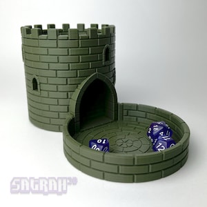 May include: A green 3D printed castle-shaped dice tower with a round base. The tower has a brick pattern and an arched doorway. The base has a circular depression for rolling dice. There are four blue dice with white numbers on the base.