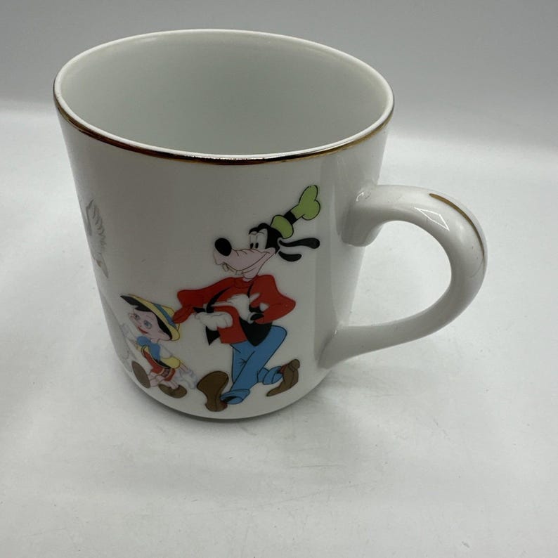 Taza de Disney Mickey Mouse y sus amigos con borde dorado, producto vintage de Disneyland. imagen 5
