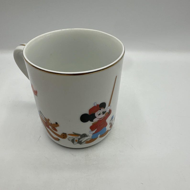 Taza de Disney Mickey Mouse y sus amigos con borde dorado, producto vintage de Disneyland. imagen 2