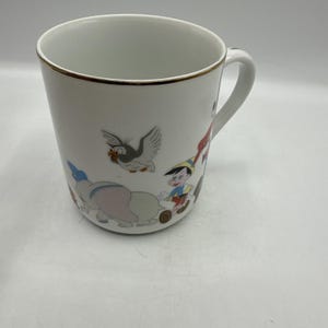 Taza de Disney Mickey Mouse y sus amigos con borde dorado, producto vintage de Disneyland. imagen 4
