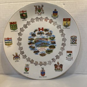 May include: A rustic wooden sign with the text "Welcome to our home" in white lettering. The sign features a distressed finish and a simple, inviting design, perfect for a front porch or entryway.