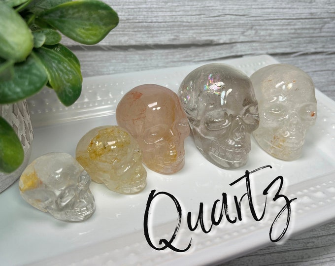 Crystal Skull Carving, Golden Healer, Rose Quartz with Fire Quartz and Golden Healer, Koi Fish Quartz, Smoky Quartz with Rainbows
