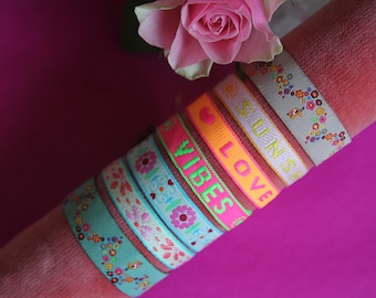 Bracelet, fabric bracelet, statement, floral motif, flowers, colorful, neon, love, good vibes, sunshine, festival, summer, woven bracelet, pink, orange, yellow