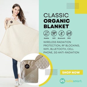 May include: A beige organic blanket with a white and beige striped pattern. The blanket is labelled "Classic Organic Blanket" and features icons for mobile, WiFi, Bluetooth, and RFID. The text "Wireless Radiation Protection, RF Blocking, WiFi, Bluetooth, Cell Phone, 5G Anti-Radiation" is also included. The blanket is shown being held by a person. The text "Shop Now" and "RS radiosmart" is also included.