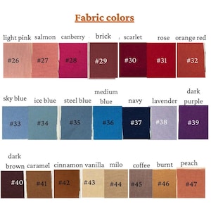 May include: A color chart displaying fabric swatches in various shades. The swatches are arranged in rows and columns, with each color labeled and numbered. Colors include light pink, salmon, canberry, brick, scarlet, rose, orange red, sky blue, ice blue, steel blue, medium blue, navy, lavender, dark purple, dark brown, caramel, cinnamon, vanilla, milo, coffee, burnt, and peach.