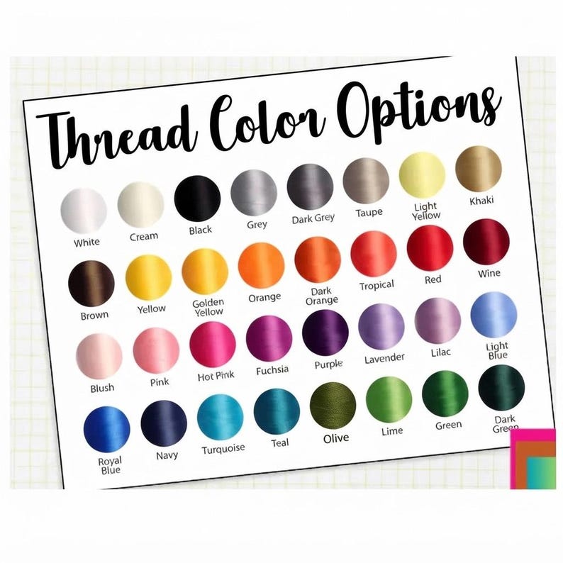 Pode incluir: Uma tabela retangular intitulada Thread Color Options exibindo trinta e duas amostras circulares de linha de bordar em v&aacute;rias cores. Cada c&iacute;rculo est&aacute; rotulado com o nome da cor correspondente, incluindo branco, preto, vermelho, azul e verde.