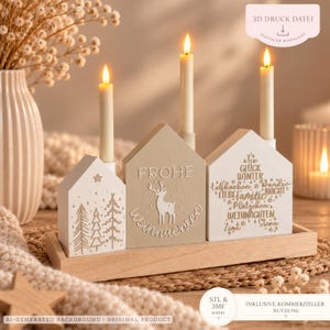 May include: A wooden candle holder set featuring three house-shaped blocks on a rectangular base. The blocks are white and beige, decorated with trees, a reindeer, and German text including Frohe Weihnachten and star-shaped words.