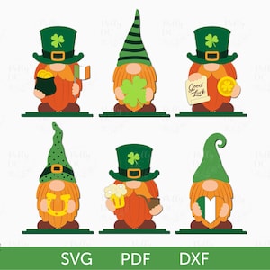 May include: Six different gnome SVG cut files. Each gnome is wearing a green hat with a shamrock and a green beard. They are holding different St. Patrick's Day themed items, including a pot of gold, a shamrock, a sign that says "Good Luck", a horseshoe, a beer mug, and an Irish heart.