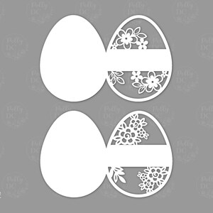 May include: Two white paper Easter egg cutouts. One egg has a blank space for writing a message. The other egg has a floral design.