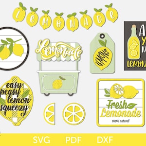 May include: A set of digital cut files for a lemonade stand theme. The files include a banner with the word "Lemonade", a sign that says "Fresh Lemonade 100% natural", a sign that says "All You Need is Lemonade", a lemon with the text "easy peasy lemon squeezy", a lemon with the text "Lemons", a lemon slice, a lemon wedge, and a lemonade stand.