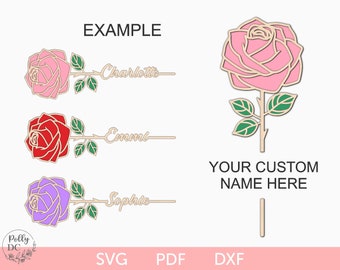 May include: A digital design file for a rose with a stem and leaves. The rose is available in pink, red, and purple. The design includes a space for a name, such as "Charlotte", "Emmi", or "Sophie".