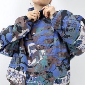 Vintage 80s/90s snowboard jacket, lightly lined, crazy pattern, blue, size L