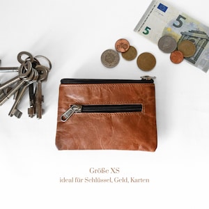 Lederbeutel Alma mit Reißverschluss aus nachhaltiger Handarbeit.
Größe XS.