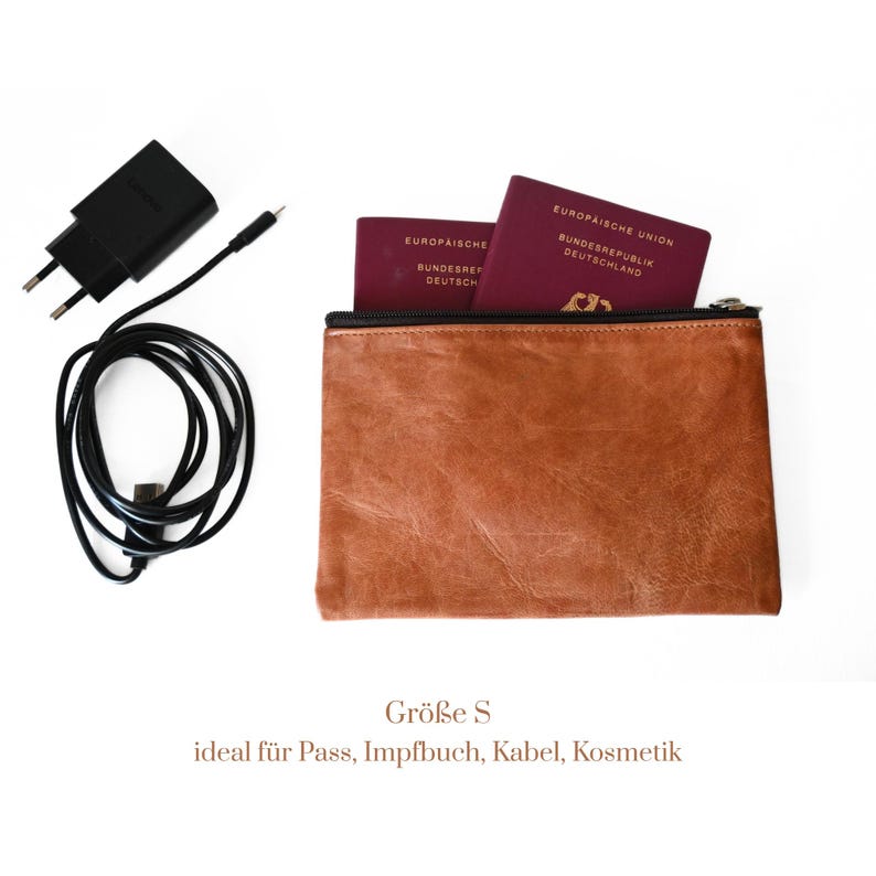 Lederbeutel Alma mit Reißverschluss aus nachhaltiger Handarbeit.
Größe M, ideal für Reisepass, Impfbuch und Ladegeräte