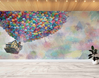 May include: A colorful illustration of a house floating in the air with a bunch of balloons attached to it. The house is yellow with white trim and has a red roof. The balloons are all different colors and shapes. The background is a watercolor wash of pink, blue, and green.