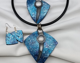 Black leather cord necklace and large cracked blue pendant in polymer clay and medium blue pendant necklace