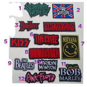 May include: A collection of twelve embroidered music band patches featuring logos for Municipal Waste, Sex Pistols, Bon Jovi, Scorpions, Kiss, The Cure, Nirvana, Soundgarden, The Beatles, Marilyn Manson, Bob Marley, and Pink Floyd in various colours.