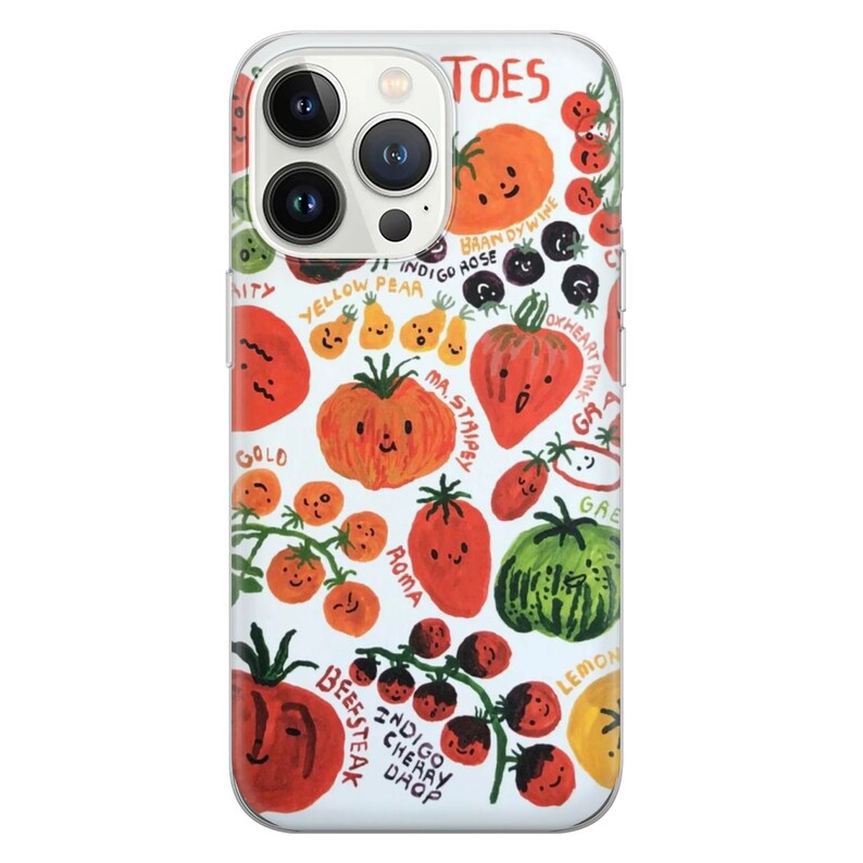 May include: White iPhone case with a colorful illustration of various tomatoes with names like 'Beefsteak', 'Indigo Cherry Drop', 'Oxheart Pink', 'Roma', 'Brandywine', 'Yellow Pear', 'Gold', 'Ma. Staipey', 'Lemon', 'Green', and 'Toes'.