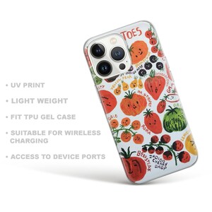 May include: A white phone case with a clear back featuring a colorful illustration of various types of tomatoes with smiling faces and names like "Roma", "Beefsteak", and "Oxheart Pink". The text "TOES" is at the top of the case.